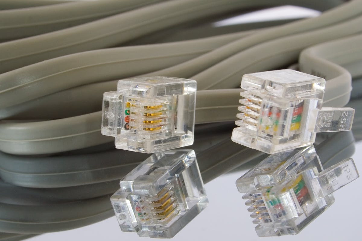 Landline phone next to a broadband router