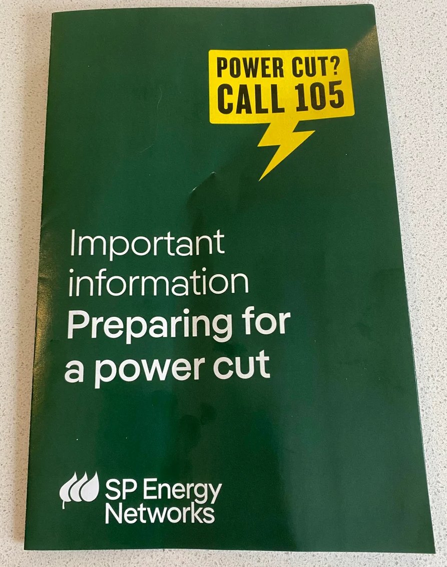 Front cover of the SP Energy Networks booklet Preparing for a power cut, green with a yellow Power cut? Call 105 sign