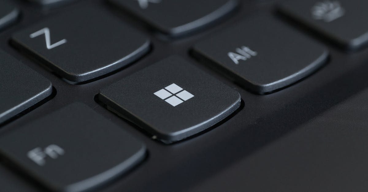 Laptop showing Windows 11 desktop with Start menu open